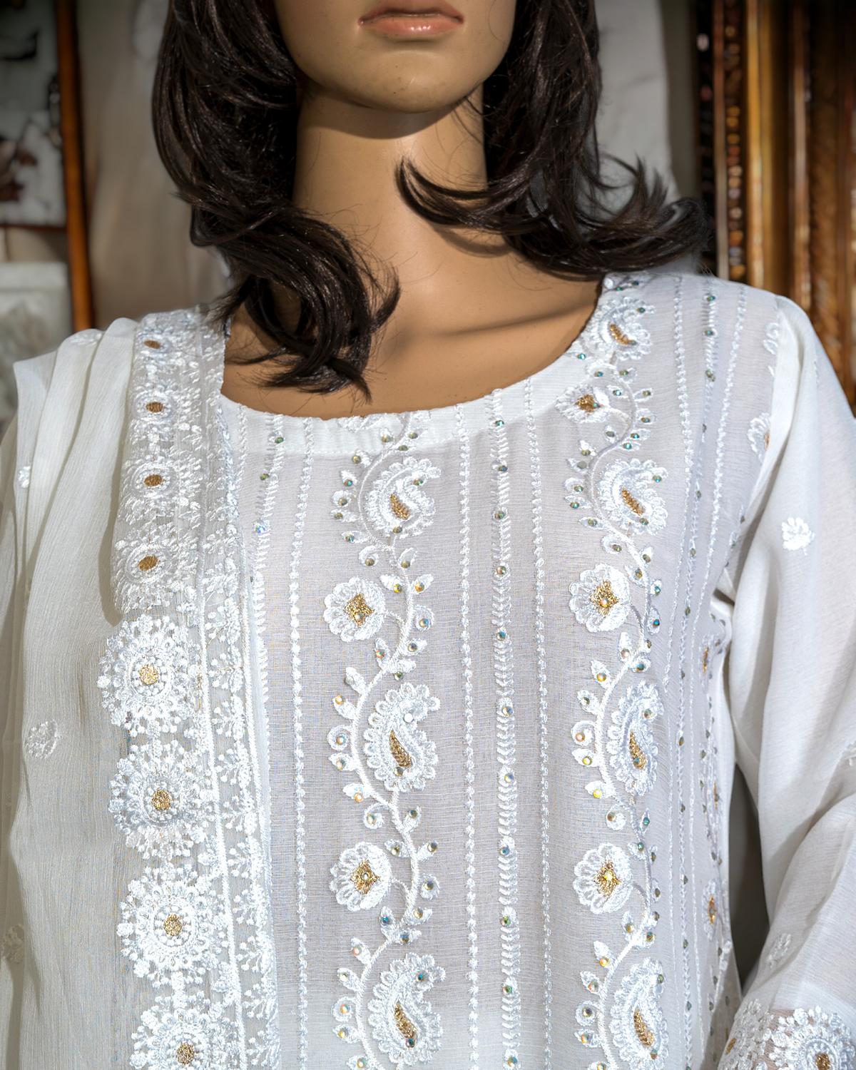 Shop Elegant White Semi-Formal Dress by Malbusaat, versatile Pakistani Dress at Malbusaat. Ready-made desi suits, Pakistani designer dresses online UK.