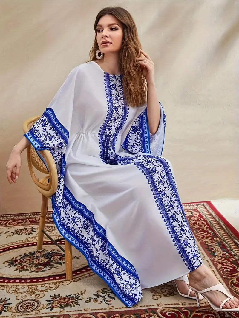 Shop Floral Print Crew Neck Kaftan Maxi Dress by Malbusaat, versatile  at Malbusaat. Ready-made desi suits, Pakistani designer dresses online UK.