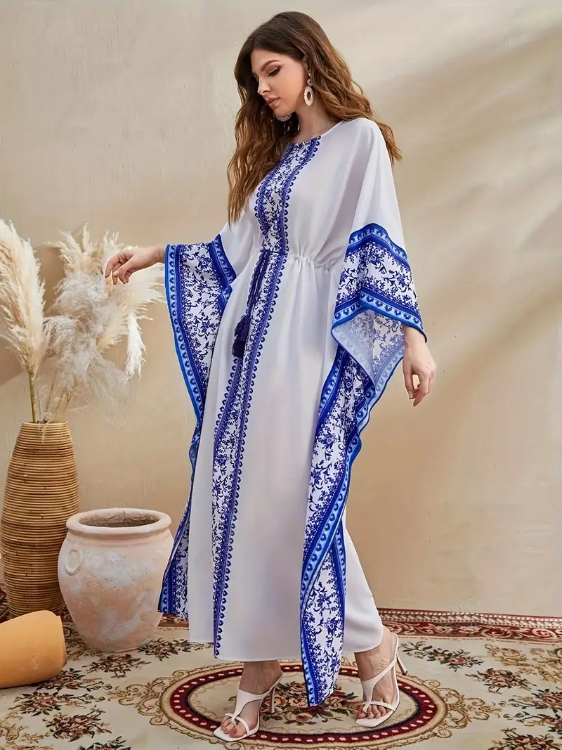 Shop Floral Print Crew Neck Kaftan Maxi Dress by Malbusaat, versatile  at Malbusaat. Ready-made desi suits, Pakistani designer dresses online UK.