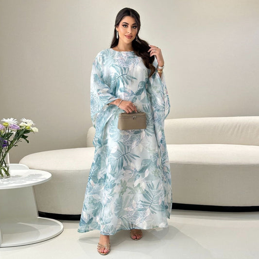 Floral Maxi Dress in - by Malbusaat