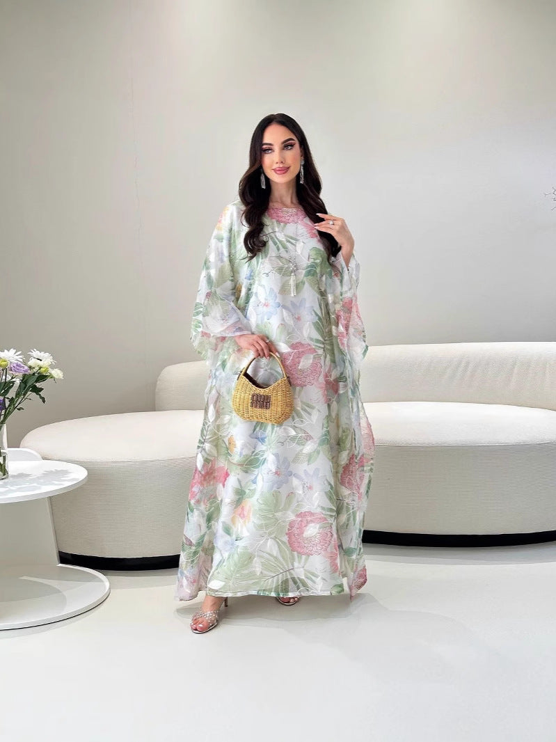 Floral Maxi Dress in - by Malbusaat