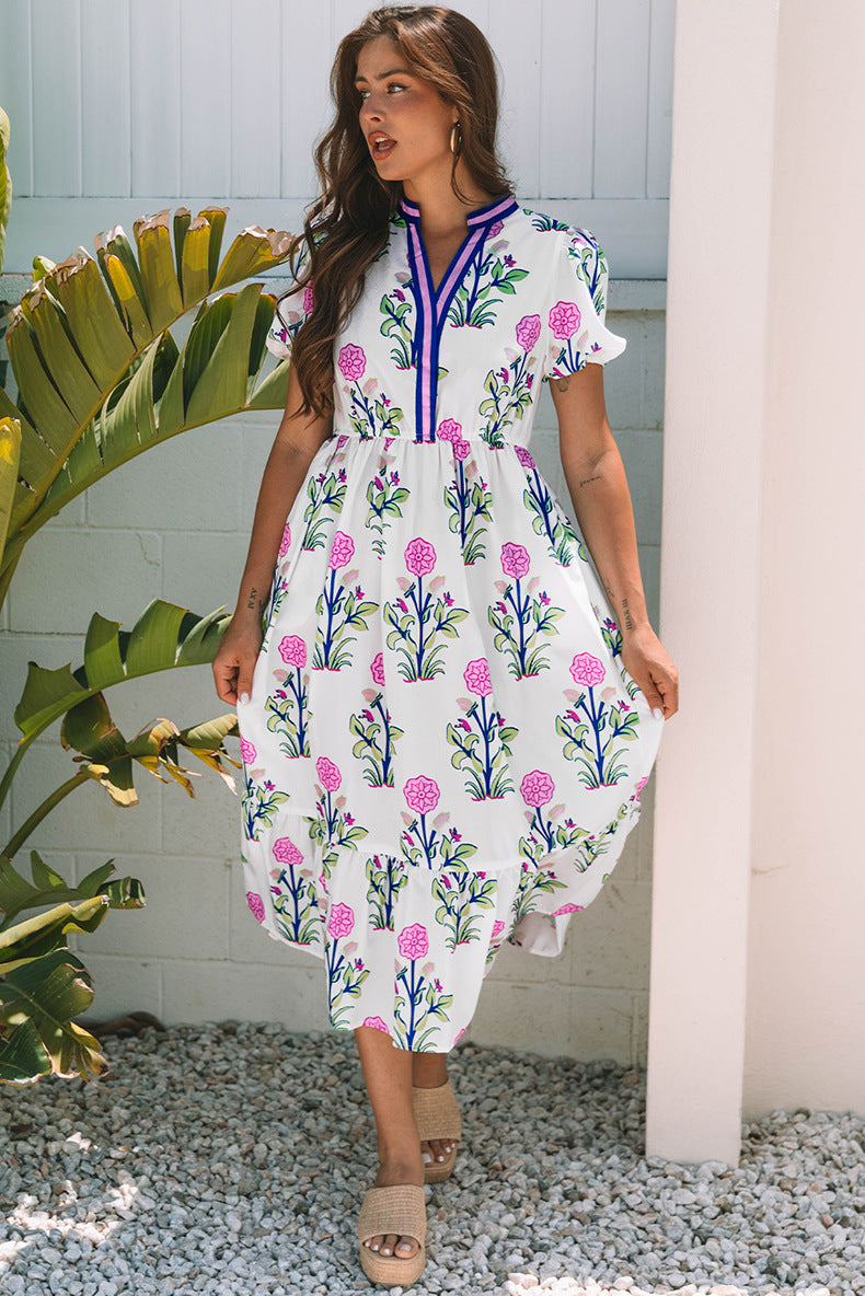 Retro Floral Dress in - by Malbusaat