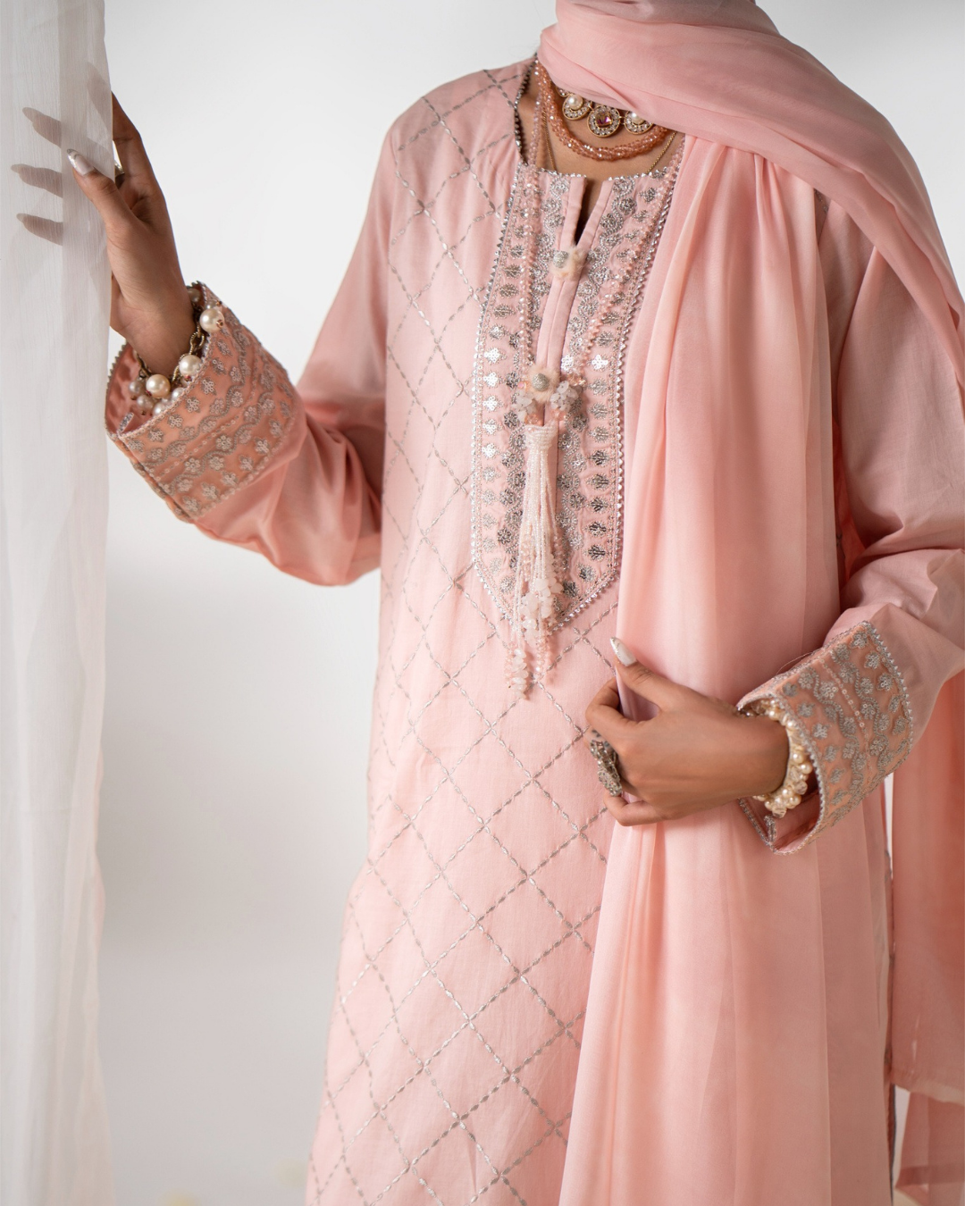 Shop Pastel Pink suit by Malbusaat, versatile Pakistani Dresses at Malbusaat. Ready-made desi suits, Pakistani designer dresses online UK.