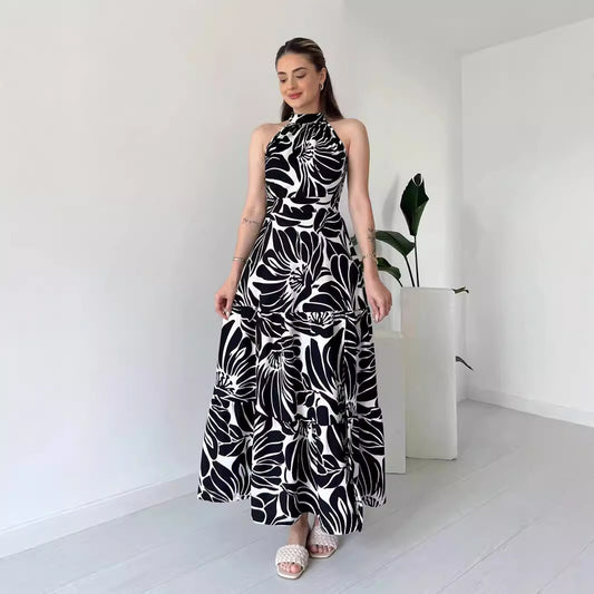 Shop Sleeveless Floral Maxi Dress with High Slit and Mock Neck by Malbusaat, versatile  at Malbusaat. Ready-made desi suits, Pakistani designer dresses online UK.