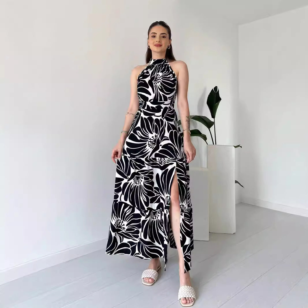 Shop Sleeveless Floral Maxi Dress with High Slit and Mock Neck by Malbusaat, versatile  at Malbusaat. Ready-made desi suits, Pakistani designer dresses online UK.