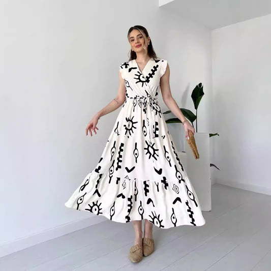 Shop V-Neck Maxi Dress with Black and White Graphic Print by Malbusaat, versatile  at Malbusaat. Ready-made desi suits, Pakistani designer dresses online UK.