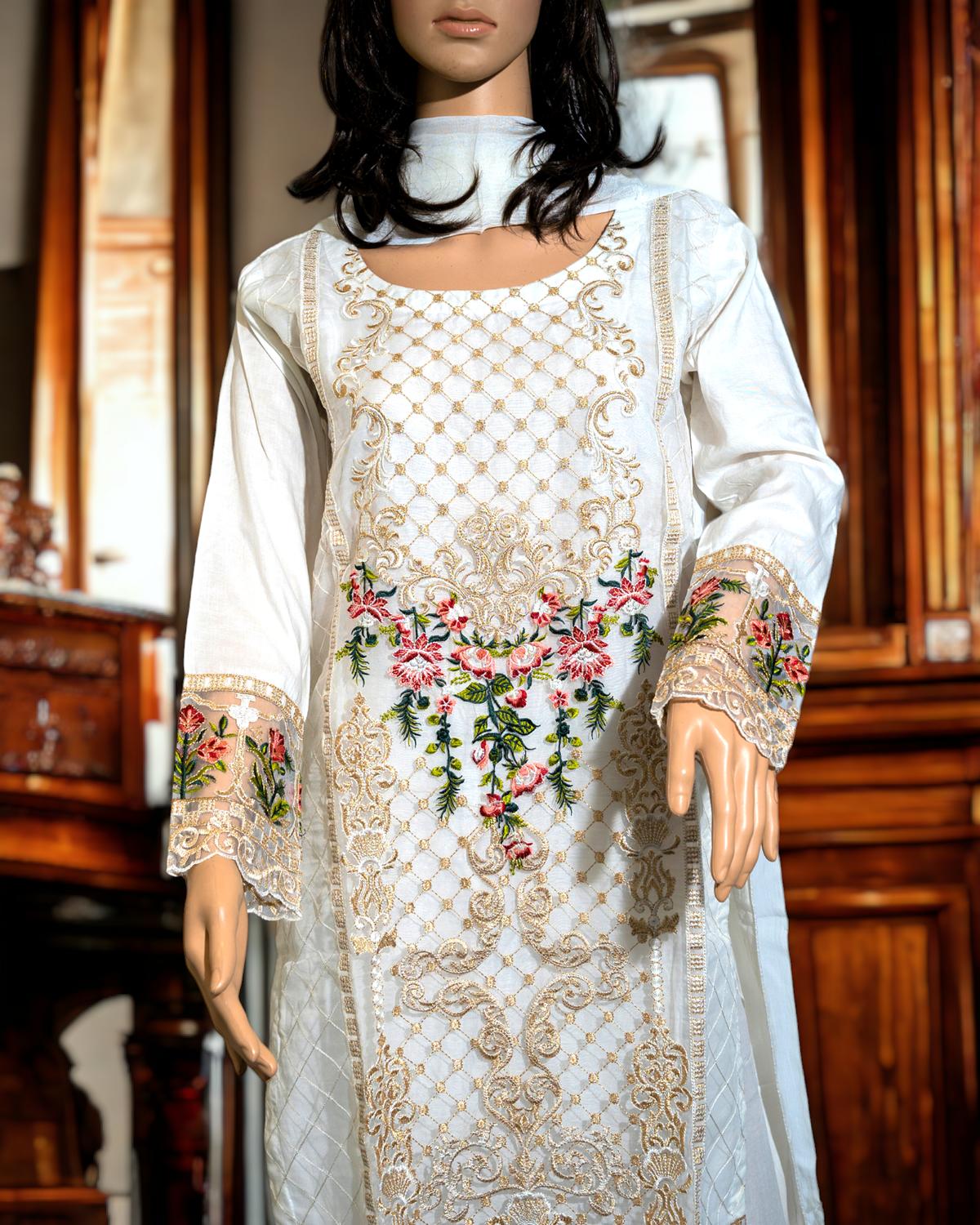 Shop White Semi-Formal Dress by Malbusaat, versatile Pakistani Dress at Malbusaat. Ready-made desi suits, Pakistani designer dresses online UK.