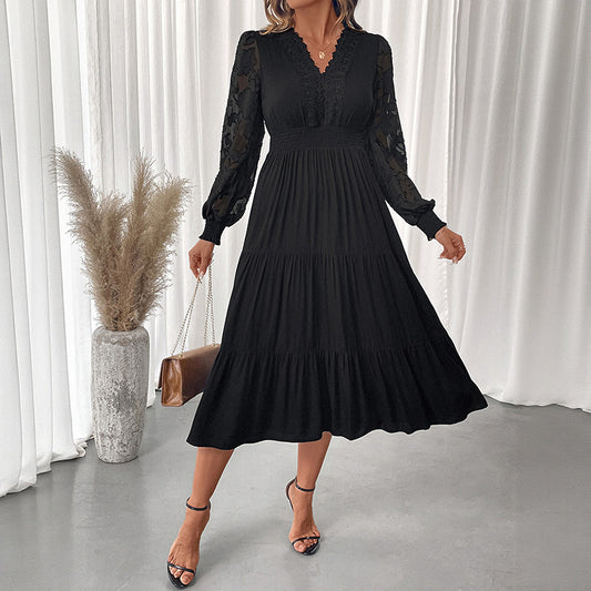 Black elegant lace long sleeve dress with tiered skirt and sheer lace sleeves by Malbusaat