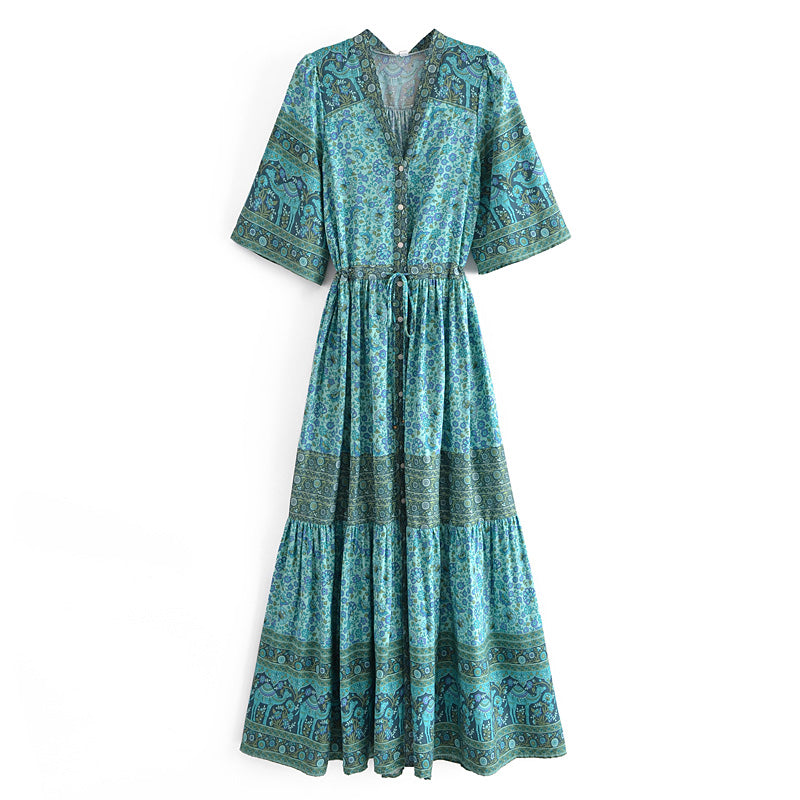 Malbusaat bohemian summer maxi dress in blue with intricate patterns and a drawstring waist