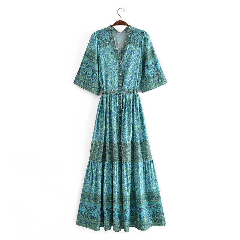 Malbusaat bohemian summer maxi dress in blue with intricate patterns and button front design