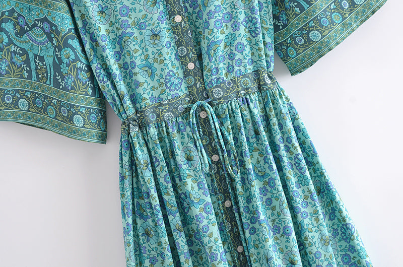 Malbusaat bohemian summer maxi dress with blue floral print and button front detail