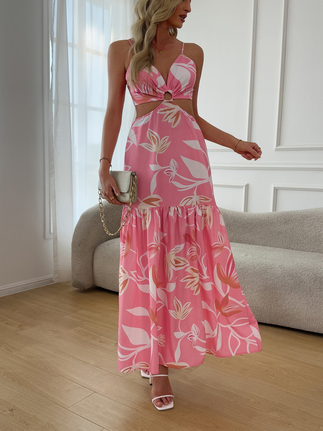 Cutout floral camisole dress in pink with a stylish design, perfect for summer occasions