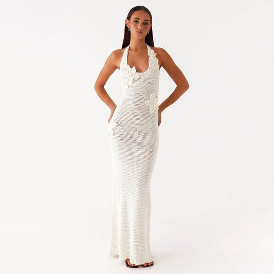 Malbusaat white crochet halter gown with three dimensional flower appliques and side cutouts floral cutout maxi dress