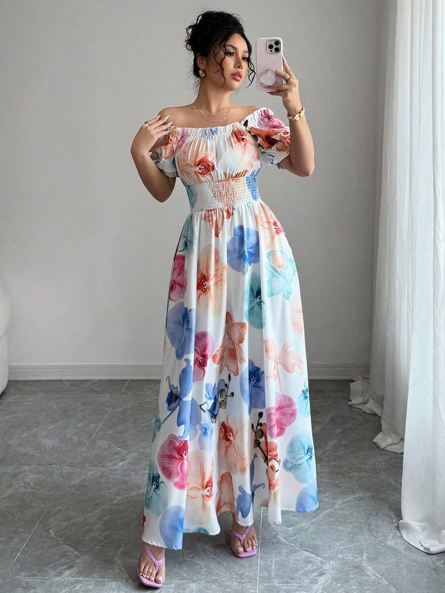 Floral Square Neck Maxi Dress with Puff Sleeves in pastel colours worn by woman posing indoors