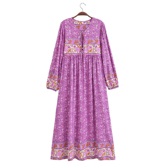 Malbusaat floral tie-neck maxi dress in purple with long sleeves and floral border details