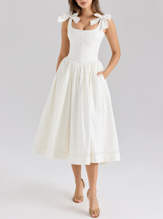 Malbusaat white midi dress with fitted bodice gathered skirt and bow shoulder ties French bowknot spaghetti dress