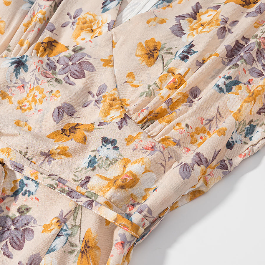 Malbusaat lace up floral pullover dress featuring a vibrant floral pattern in soft colours