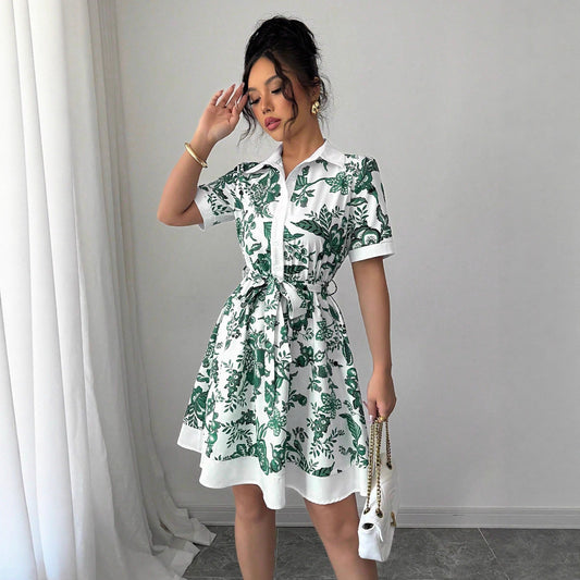 Malbusaat lace up waist midi dress in white with green floral print and a line silhouette