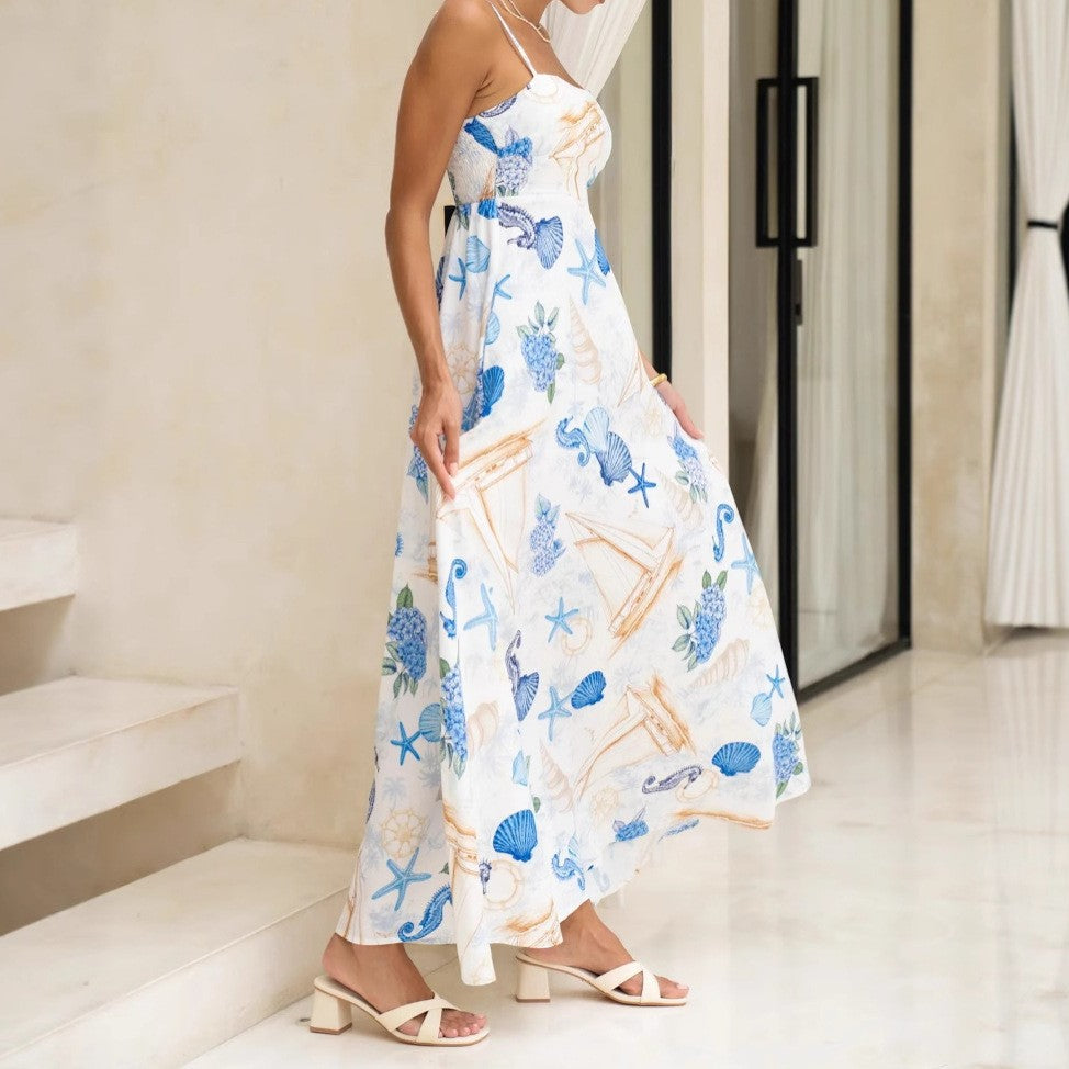Malbusaat nautical print maxi dress with seashells and marine motifs on a flowing fabric