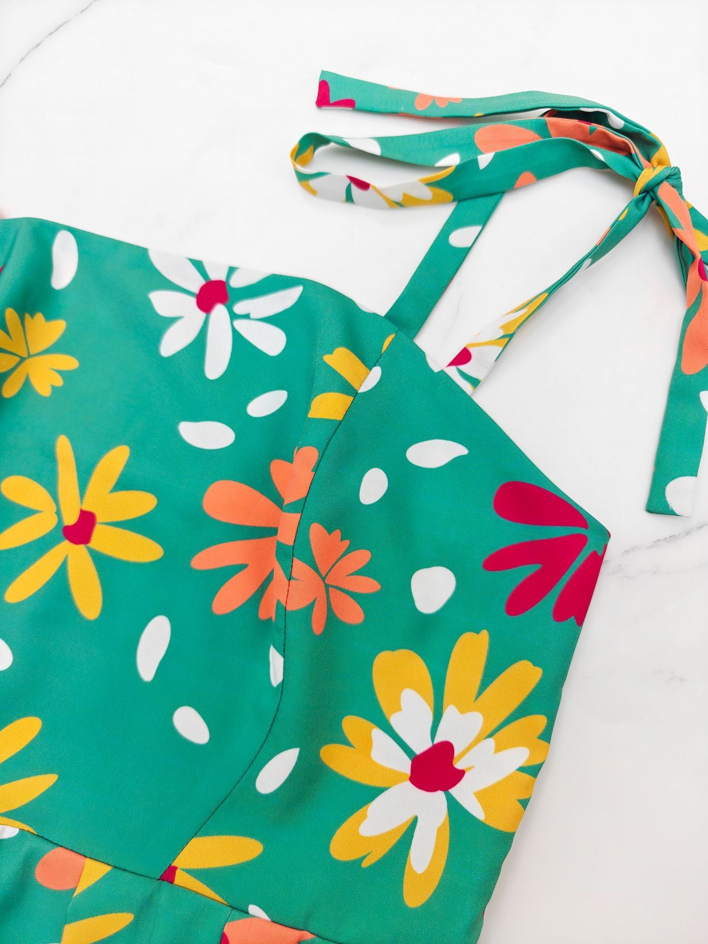 Vibrant off shoulder floral midi dress with colourful flower print and adjustable tie straps