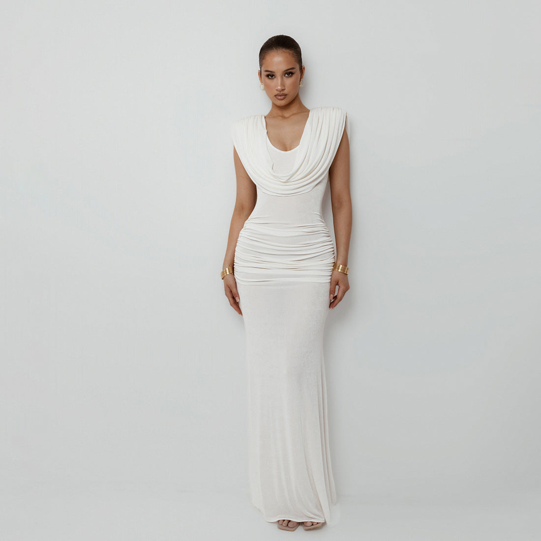 Elegant white pleated maxi dress UK with a flattering draped neckline and fitted silhouette