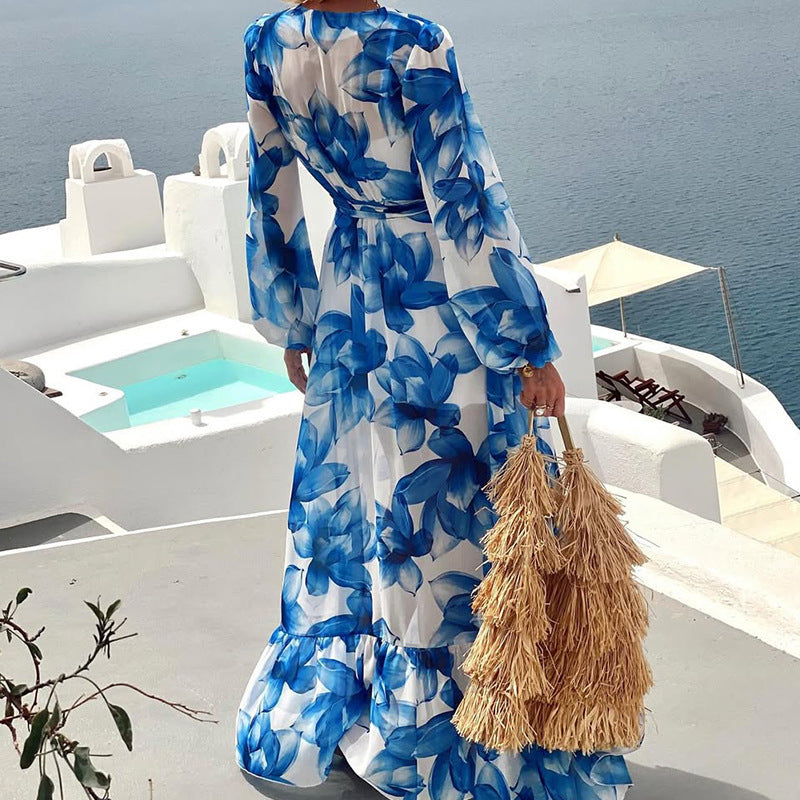 Malbusaat printed v neck tiered dress in blue floral pattern, perfect for summer outings