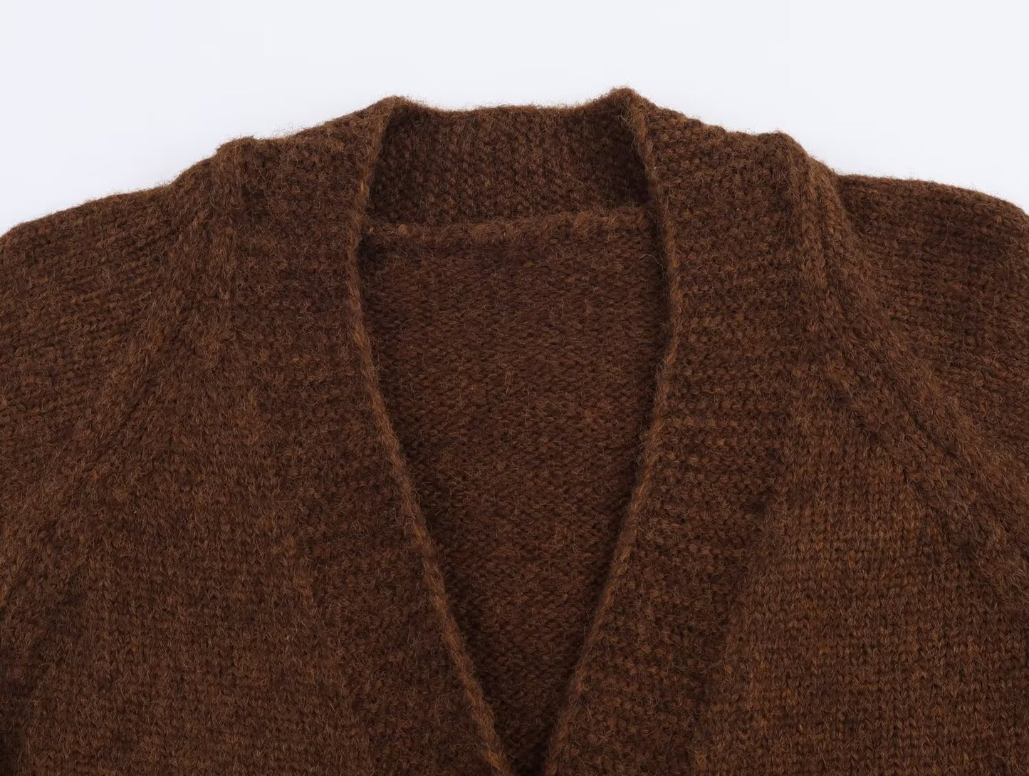Brown Malbusaat retro v neck knit cardigan with a cosy and stylish design