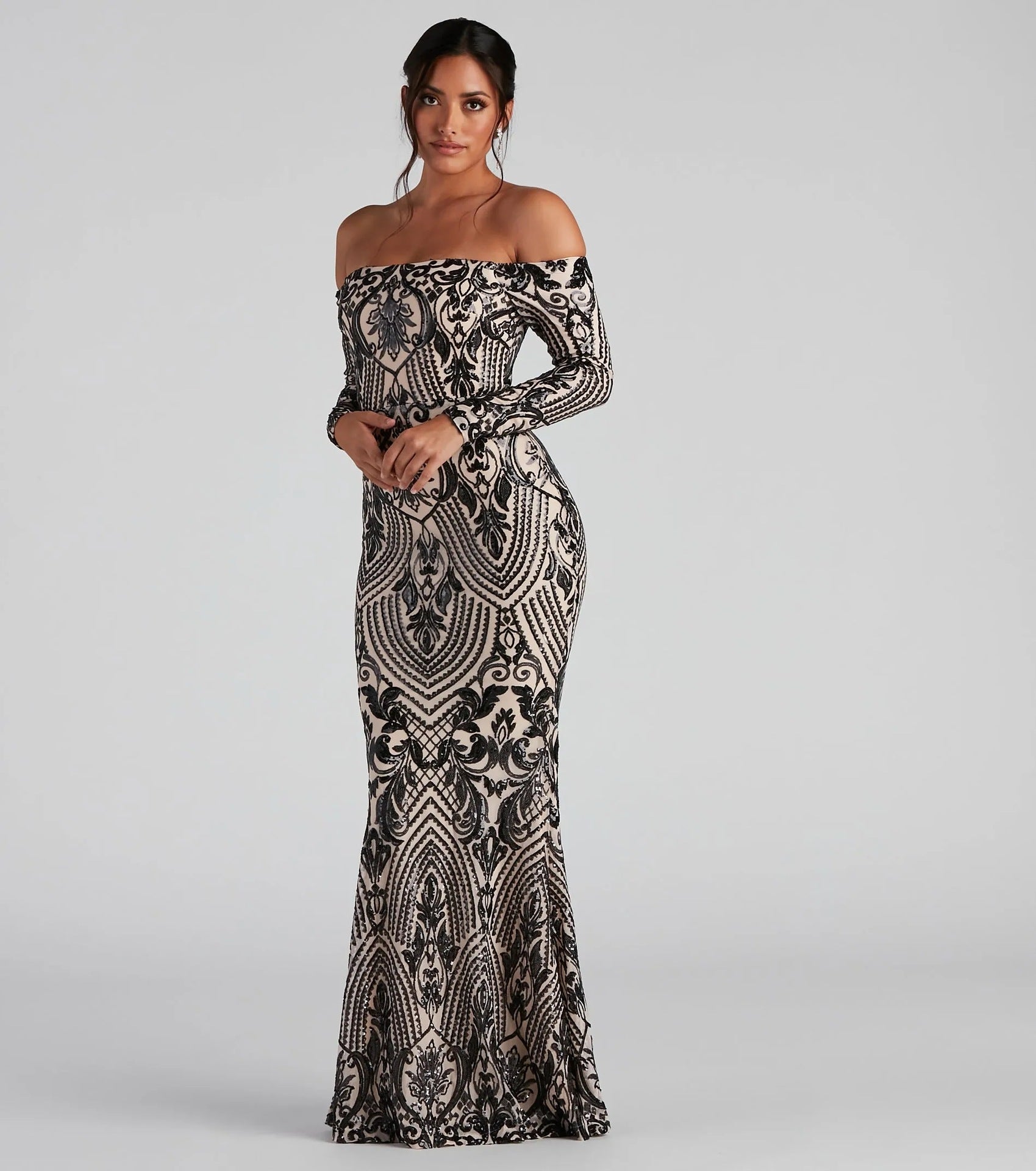 Elegant sequin off shoulder maxi dress by Malbusaat with a flattering fit and intricate pattern