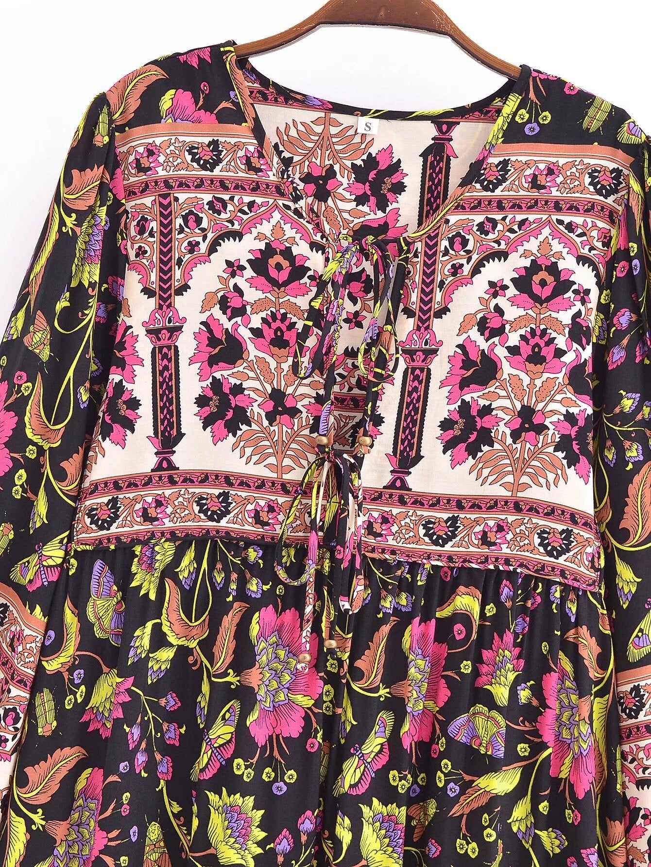 Malbusaat spring floral print maxi dress featuring vibrant pink and green flowers on black fabric