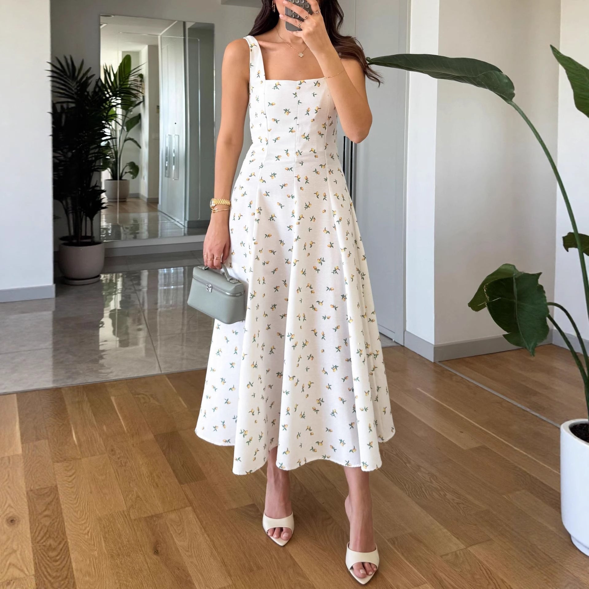 Malbusaat square neck holiday midi dress in white with floral print and flattering fit