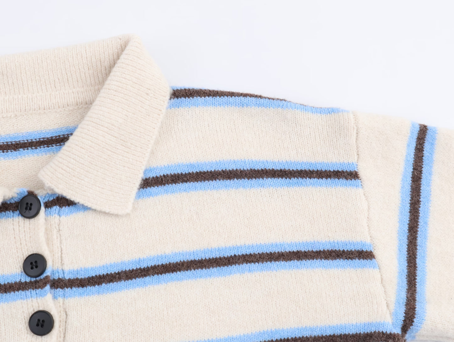 Cream and blue striped polo knit pullover for women with buttoned collar and soft fabric