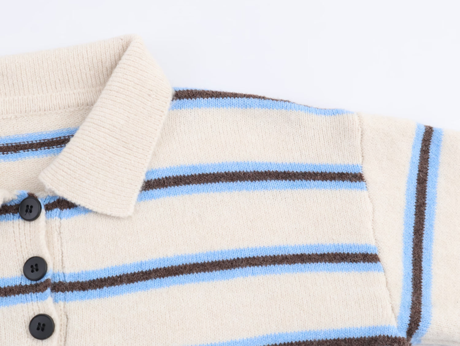 Cream and blue striped polo knit pullover for women with buttoned collar and soft fabric