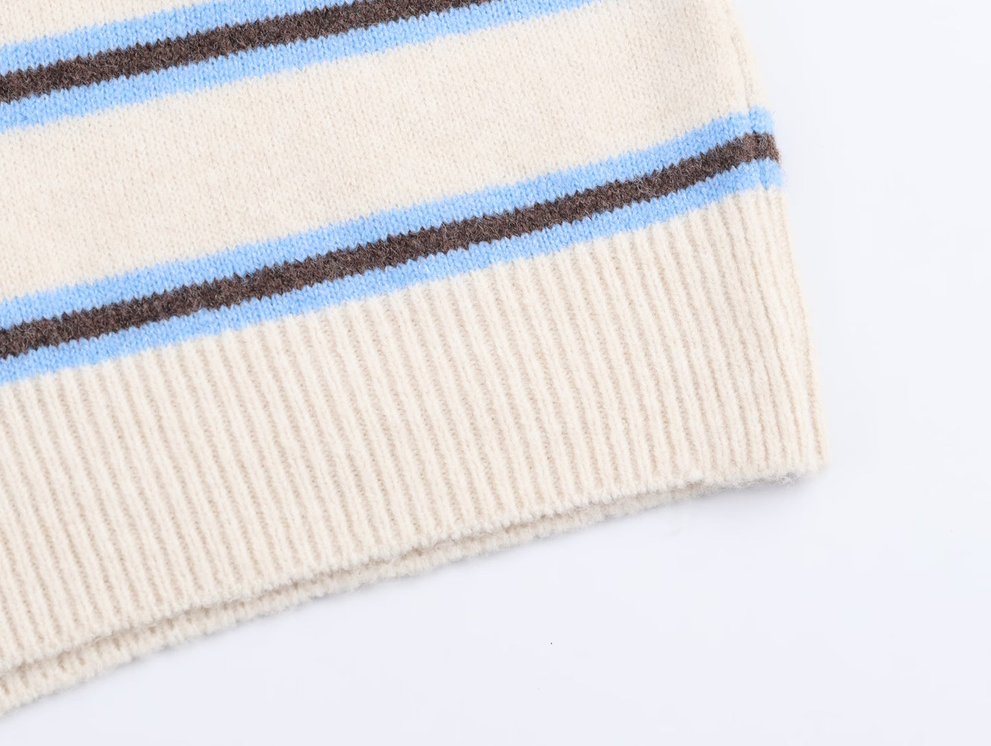 Malbusaat striped polo knit pullover for women featuring a cream base with blue and brown stripes