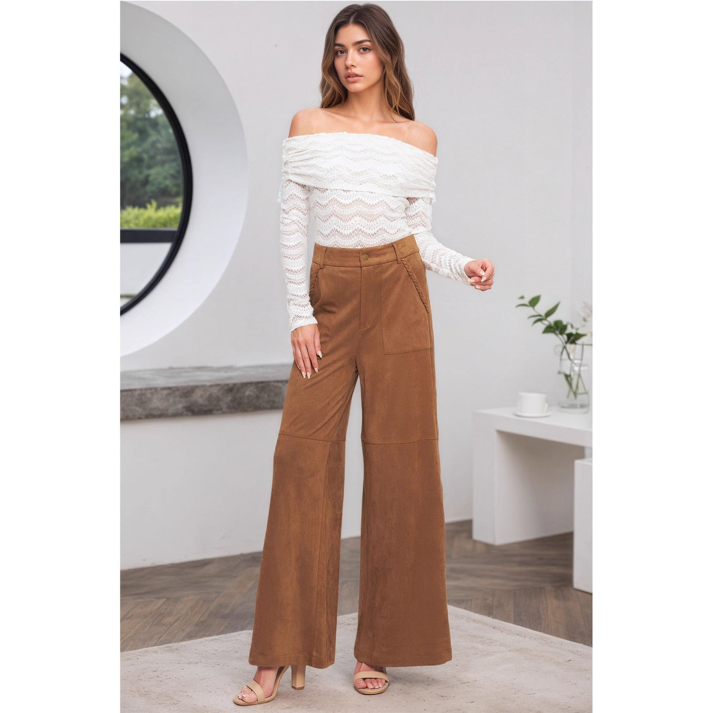 Malbusaat suede wide leg trousers women in brown, styled with a white off-shoulder top for a chic look