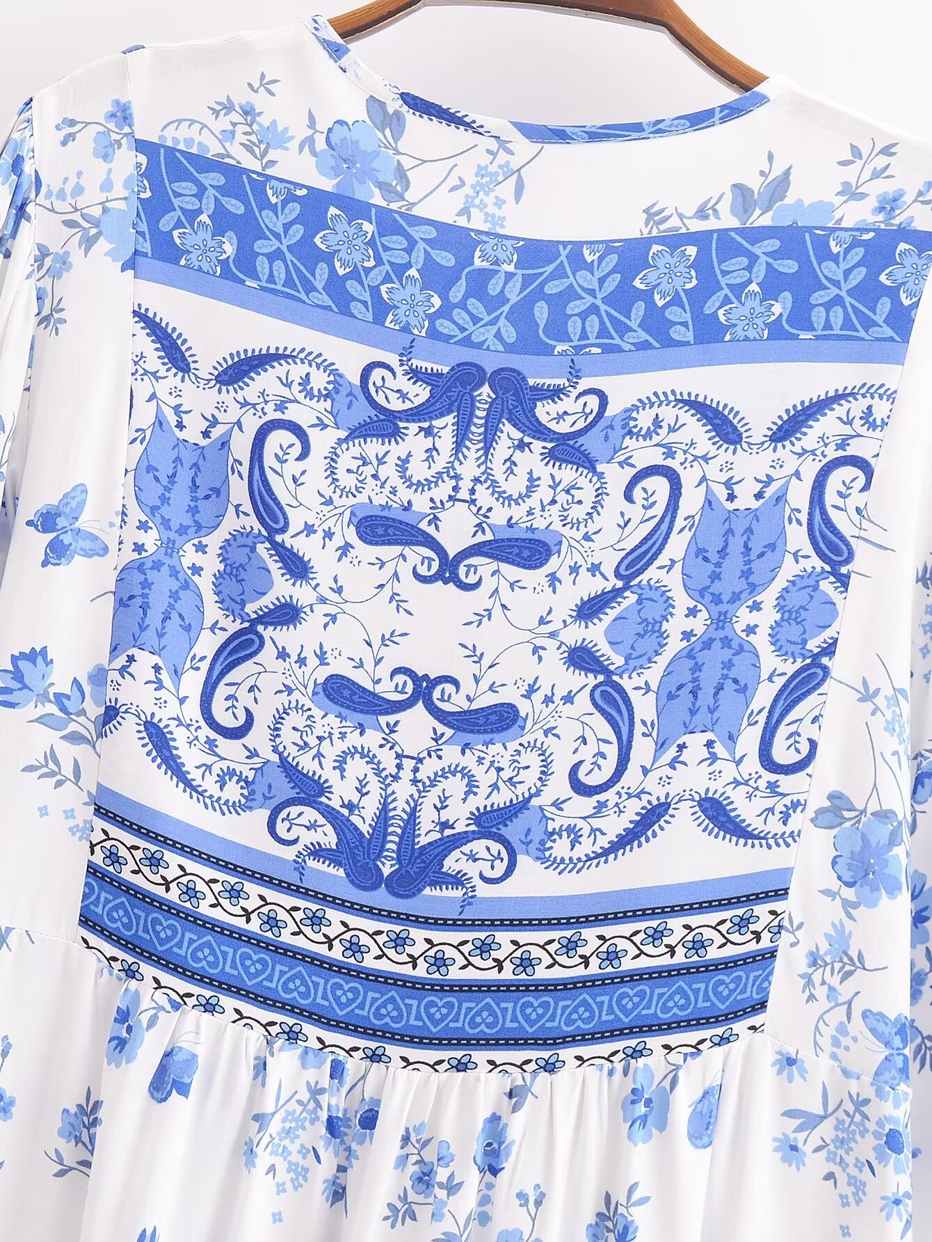 Malbusaat elegant puff sleeve spring midi dress with blue floral and intricate pattern on white fabric