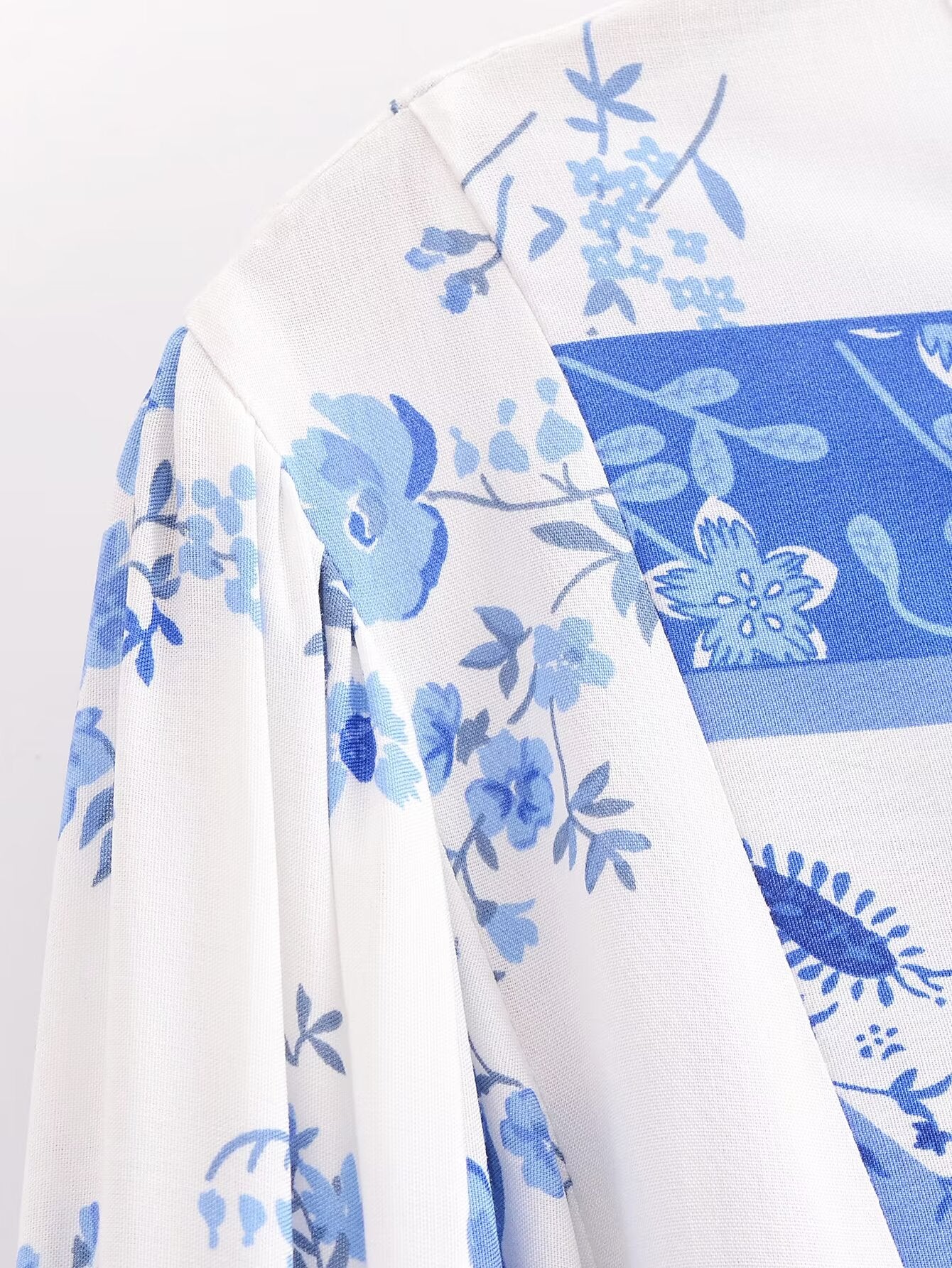 Malbusaat elegant puff sleeve spring midi dress with blue floral pattern on white fabric