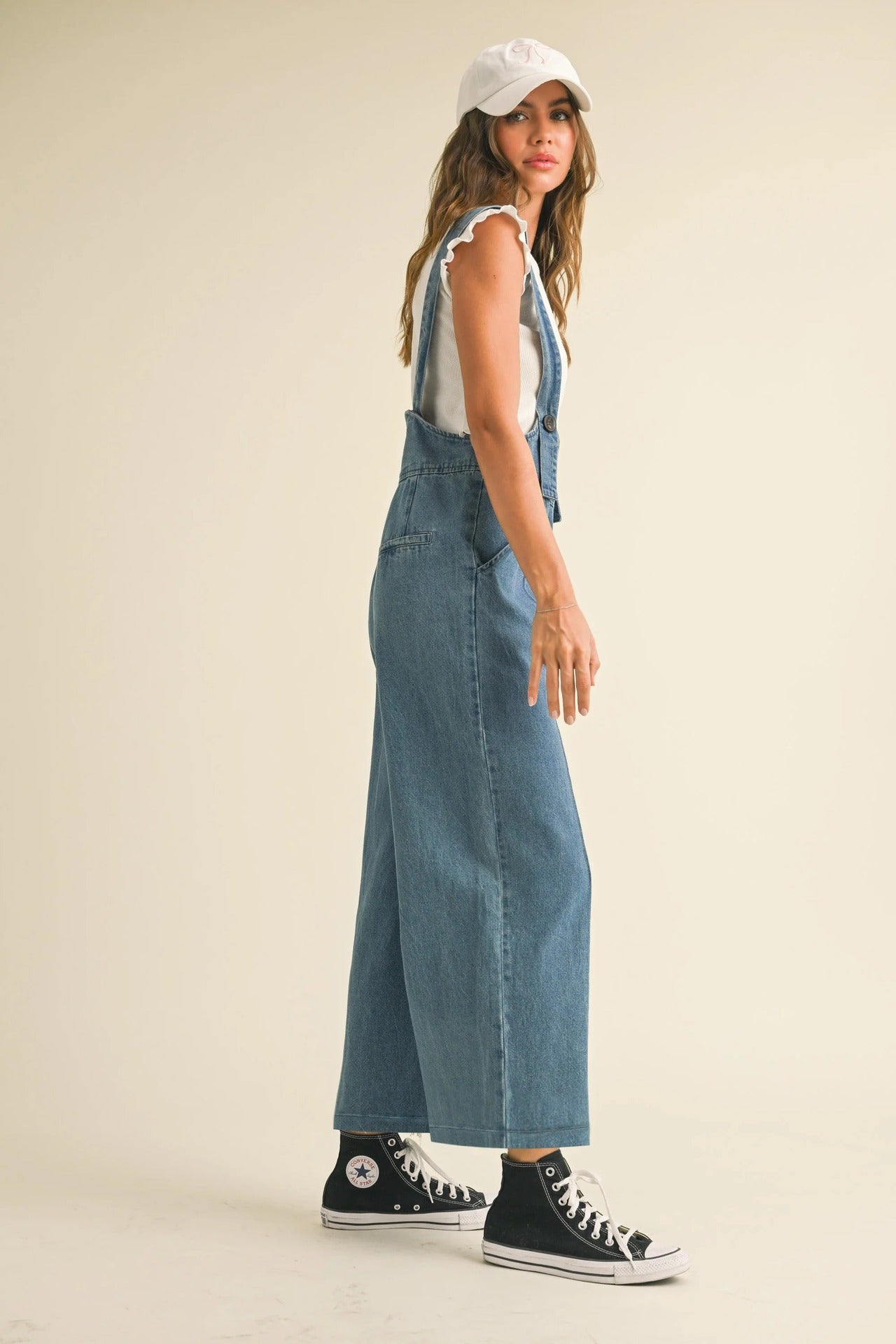 Stylish women's denim suspender pants by Malbusaat, perfect for casual summer outfits