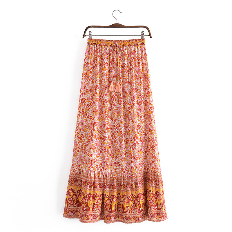 Shop Boho Vacation Floral Maxi Skirt with Tassel Tie by Malbusaat, versatile Skirts at Malbusaat. Ready-made desi suits, Pakistani designer dresses online UK.